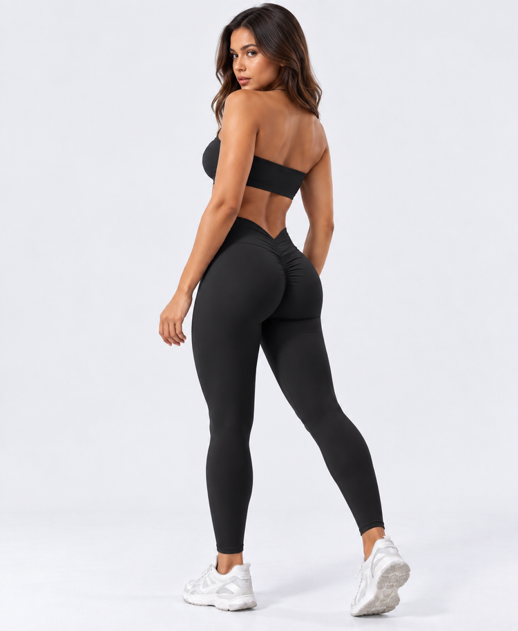 Black Liftiva CurveLift V-Back Sculpt Leggings shown from the back, highlighting the V-shaped waistband and ruched seam.