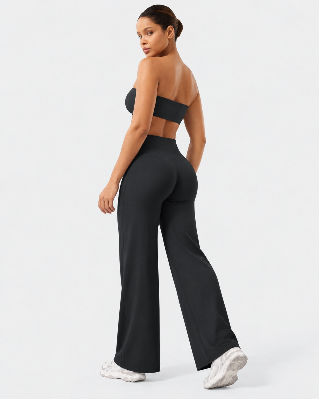 Liftiva black straight-leg yoga pants three-quarter back model view